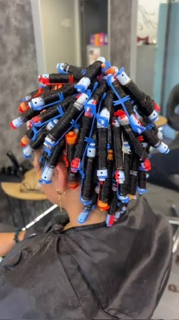 Permanente et boucles souples réalisées chez Carré B coiffure